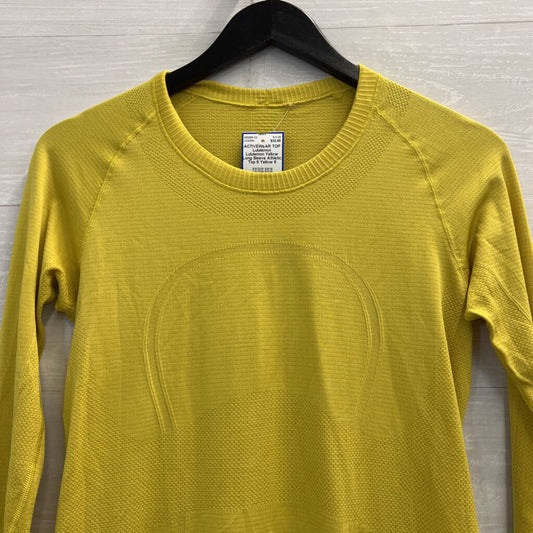 Lululemon Yellow Long Sleeve Athletic Top 8