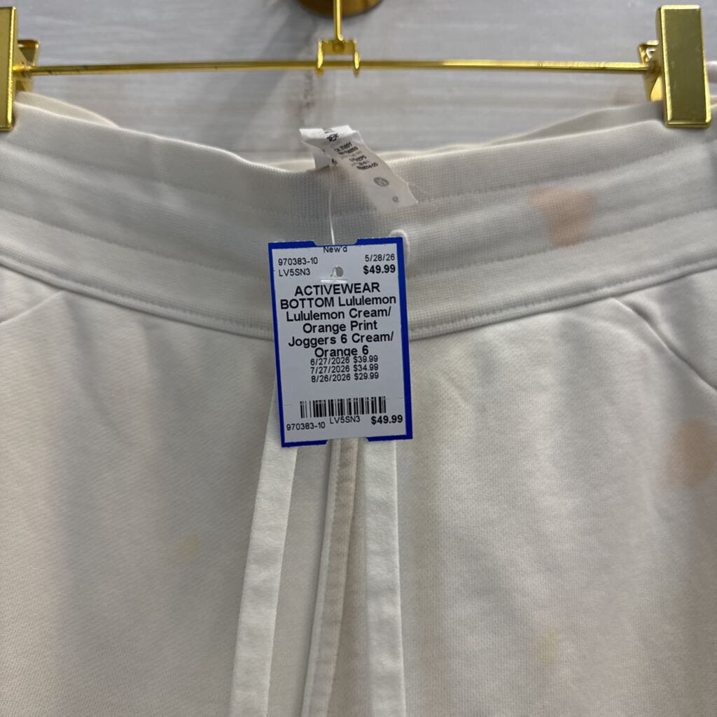 Lululemon Cream/ Orange Print Joggers 6