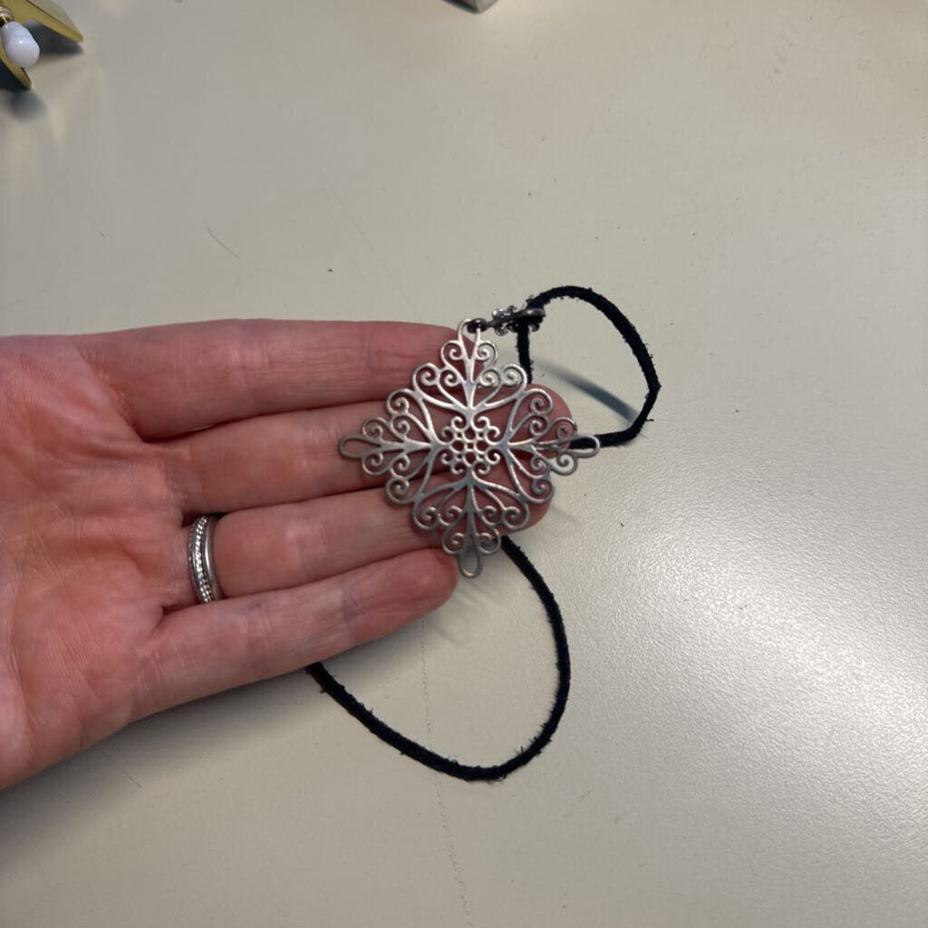 Silver Medallion with Black Cord
